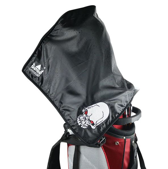 Craftsman Golf Waffle Golf Towel pictured on top of a golf bag keeping the clubs dry.