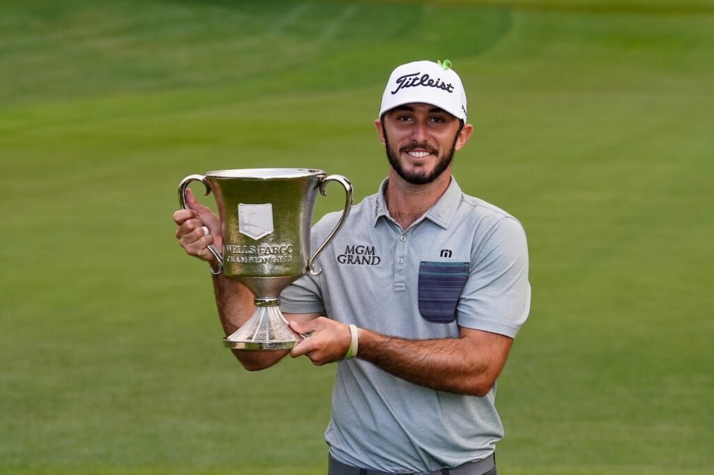Max Homa holding the Wells Fargo Championship trophy in 2019 after his maiden PGA Tour win