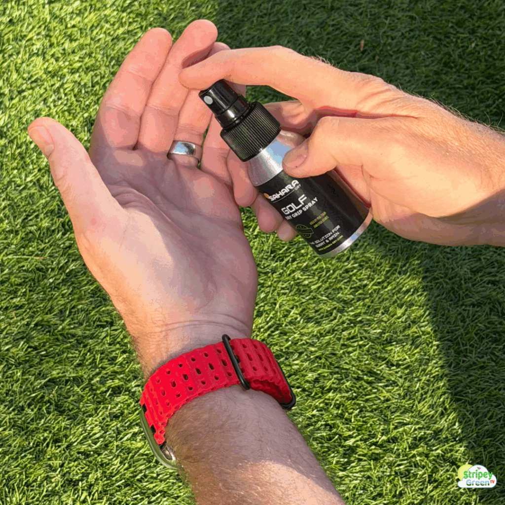 Spraying Sahara Golf Grip Spray onto your Hands